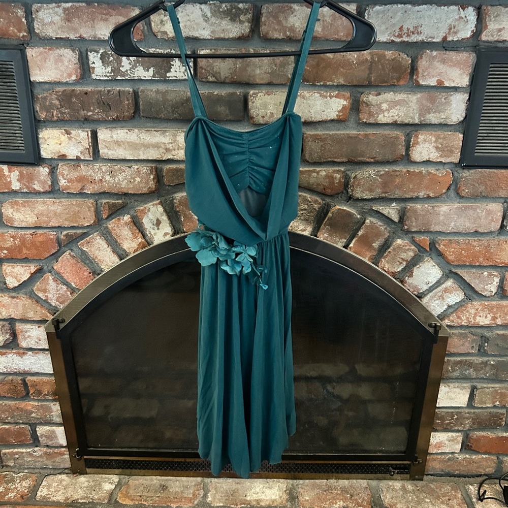Green Lyrical Dress with Floral Accent